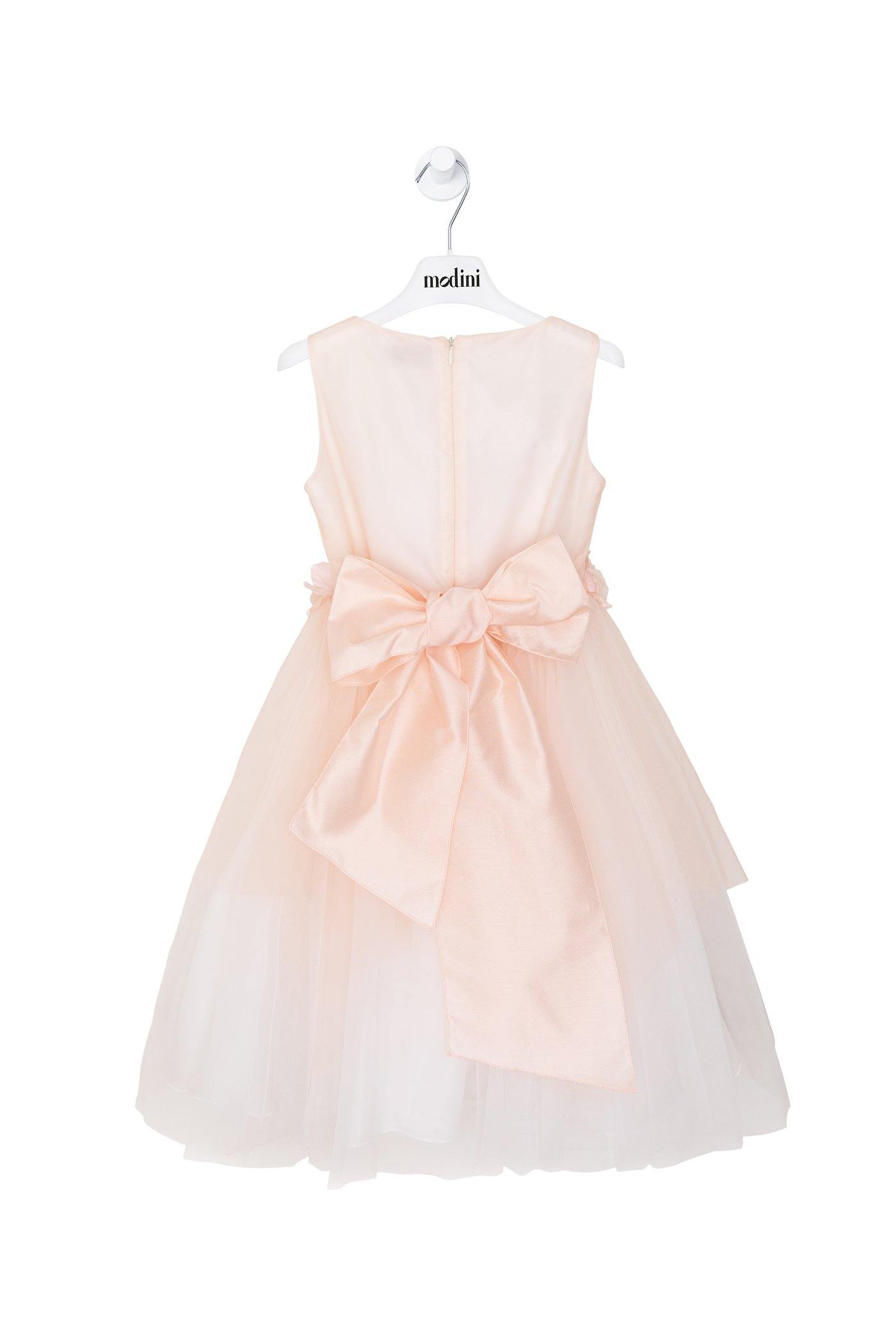 Vestido de ceremonia para niña con una flor y lazada rosa de Bimbalo - Modini Shop