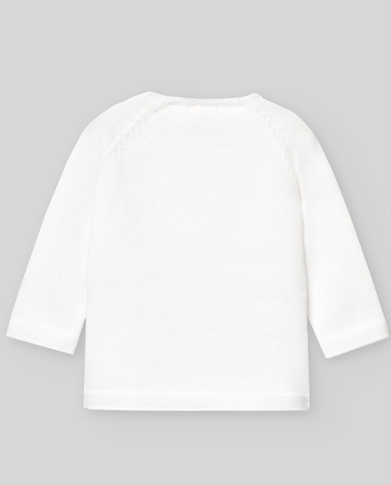 Conjunto blanco con gorro de la marca Paz Rodriguez