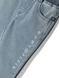 بنطال جينز طويل باللون الأزرق الفاتح مع شعار Philipp Plein وجيوب