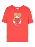 ملابس البنات - تيشيرت أحمر بطبعة الدب وشعار MOSCHINO