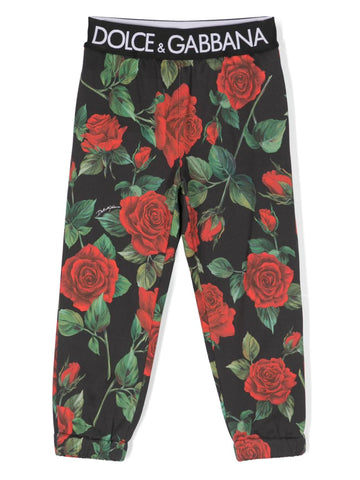 Pantalón con print rosas y con logo en la cinturilla Dolce & Gabbana