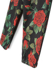 Trousers with rose-print and logo on the waistband Dolce & Gabbana