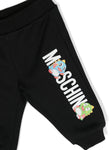 Traje deportivo con caricatura estampada de la marca Moschino