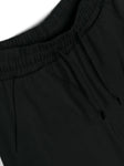 Ropa para niños - set de camiseta blanca y pantalónes cortos negros con logo MOSCHINO