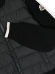 Chaqueta negra plumífero con paneles de la marca MONCLER