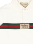 Polo blanco con logo estampado de la marca Gucci kids