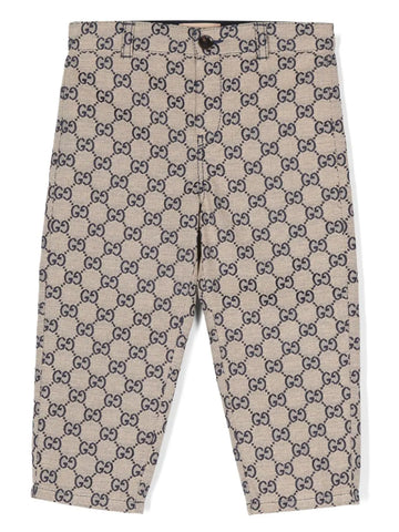 Long pants with GG motif by Gucci kids brand