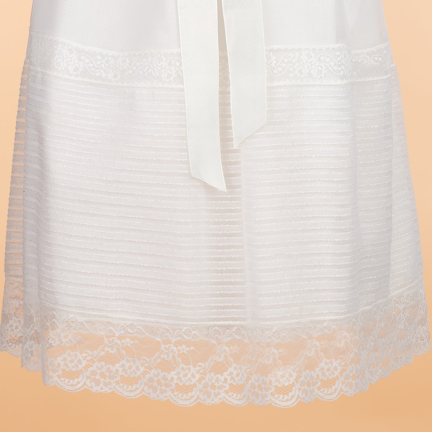 Faldón Raya Seda con gorro de la marca Belan