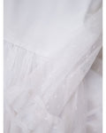 White communion dress with tulle sleeves by PETRITAS brand.